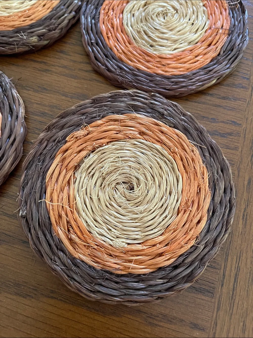 Vintage Round Woven Coasters in Brown, Orange, and Natural